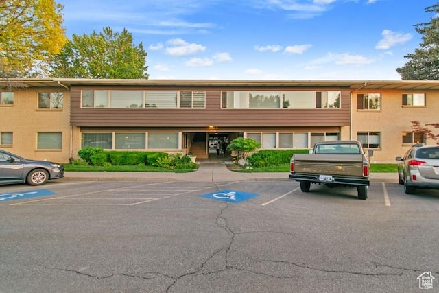 1132 E 2700 S Unit E36, Millcreek, UT 84106 - view of building exterior with uncovered parking