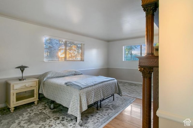 1132 E 2700 S Unit E36, Millcreek, UT 84106 - bedroom featuring wood finished floors and ornamental molding