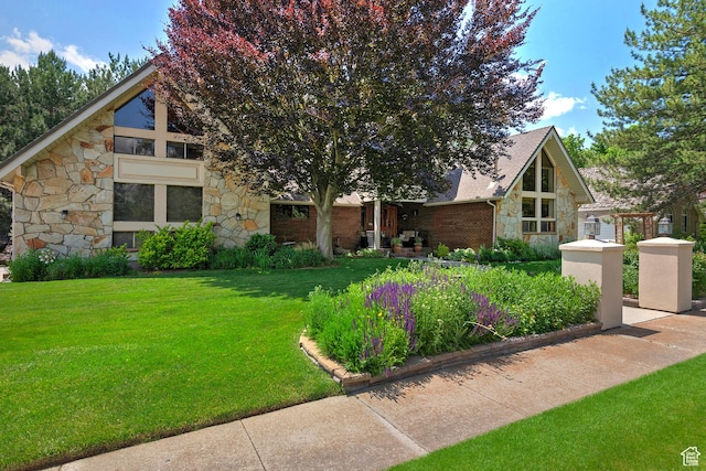 12144 S Mountain Shadow Rd, Sandy, UT 84092 - mid-century home featuring stone siding and a front lawn