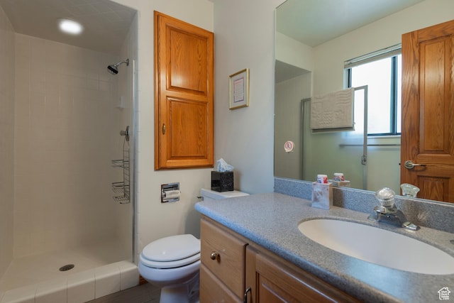 12144 S Mountain Shadow Rd, Sandy, UT 84092 - bathroom featuring vanity, toilet, and tiled shower