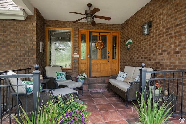 12144 S Mountain Shadow Rd, Sandy, UT 84092 - view of exterior entry with brick siding, ceiling fan, an outdoor hangout area, and covered porch