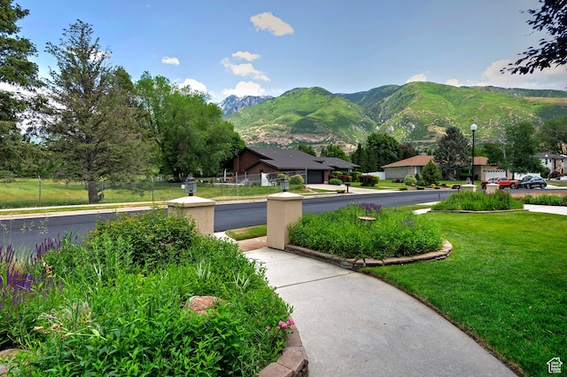 12144 S Mountain Shadow Rd, Sandy, UT 84092 - surrounding community featuring a mountain view and a yard
