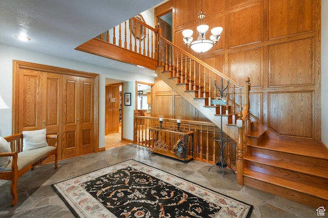 12144 S Mountain Shadow Rd, Sandy, UT 84092 - stairs with a chandelier