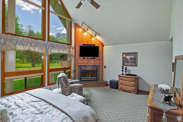 12144 S Mountain Shadow Rd, Sandy, UT 84092 - carpeted bedroom with a fireplace and high vaulted ceiling