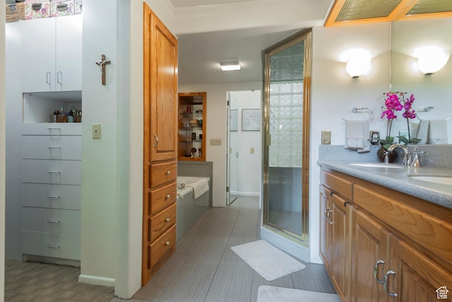 12144 S Mountain Shadow Rd, Sandy, UT 84092 - full bath with a bath, double vanity, a shower stall, and baseboards