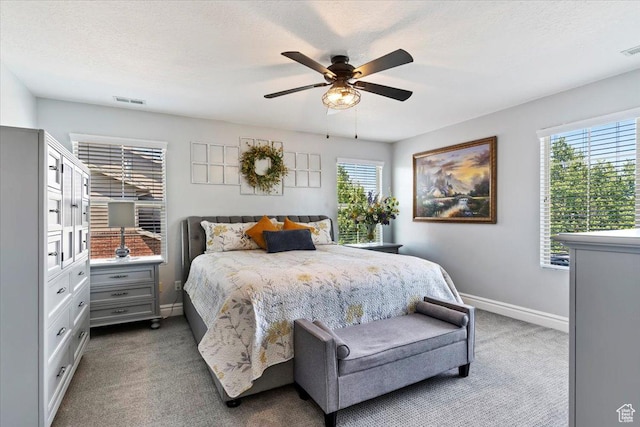160 S 2875 W, West Point, UT 84015 - bedroom featuring carpet, baseboards, multiple windows, and a ceiling fan