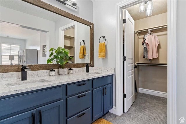 160 S 2875 W, West Point, UT 84015 - full bathroom featuring double vanity and a walk in closet