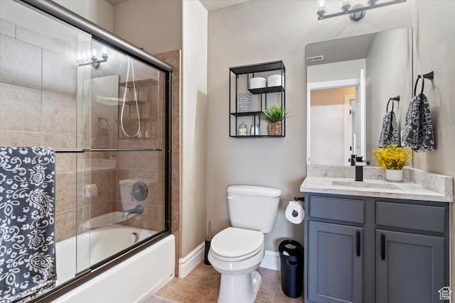160 S 2875 W, West Point, UT 84015 - full bath featuring toilet, vanity, shower / bath combination with glass door, tile patterned floors, and baseboards
