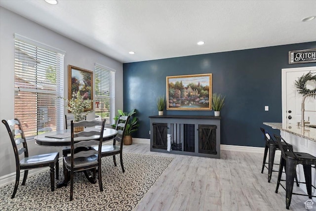 160 S 2875 W, West Point, UT 84015 - dining space featuring baseboards, wood finished floors, and recessed lighting