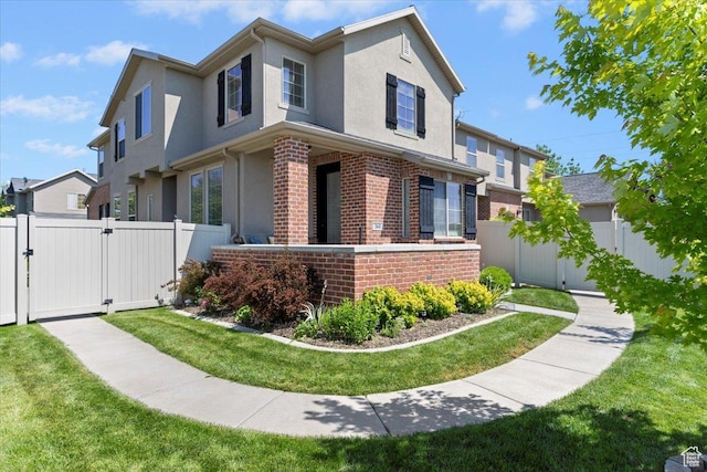 160 S 2875 W, West Point, UT 84015 - traditional-style home featuring a gate, brick siding, and stucco siding