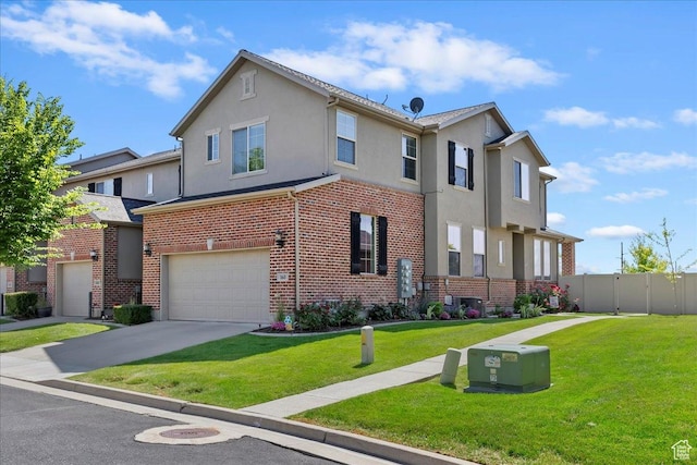 160 S 2875 W, West Point, UT 84015 - view of property with a garage, concrete driveway, stucco siding, and brick siding