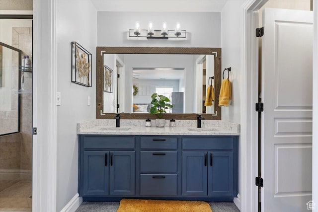160 S 2875 W, West Point, UT 84015 - bathroom featuring a shower stall, double vanity, and baseboards
