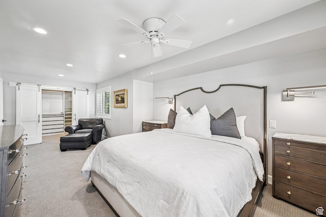 4610 S Locust Ln, Holladay, UT 84117 - carpeted bedroom with recessed lighting, ceiling fan, a closet, a walk in closet, and a barn door
