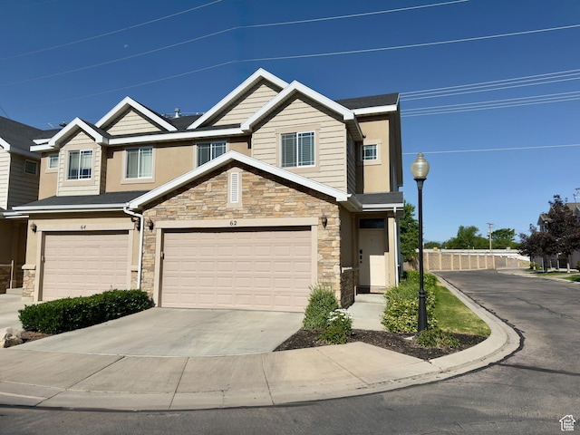 62 S 610 E, American Fork, UT 84003 - townhome / multi-family property featuring stone siding, concrete driveway, and a garage