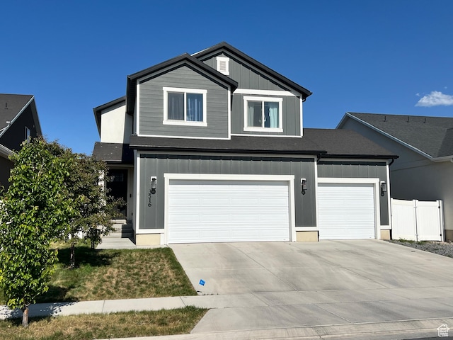 3516 N Willy Way, Eagle Mountain, UT 84005 - view of front of property featuring driveway, board and batten siding, and an attached garage