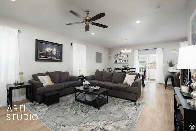 3516 N Willy Way, Eagle Mountain, UT 84005 - living area with a ceiling fan, a chandelier, light wood-style flooring, and recessed lighting