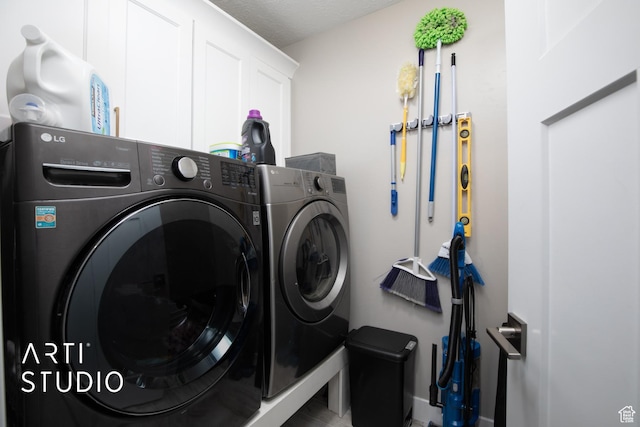 3516 N Willy Way, Eagle Mountain, UT 84005 - laundry area featuring independent washer and dryer, cabinet space, and baseboards