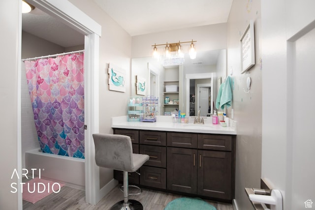 3516 N Willy Way, Eagle Mountain, UT 84005 - full bathroom with wood finished floors, vanity, shower / bath combo with shower curtain, and baseboards