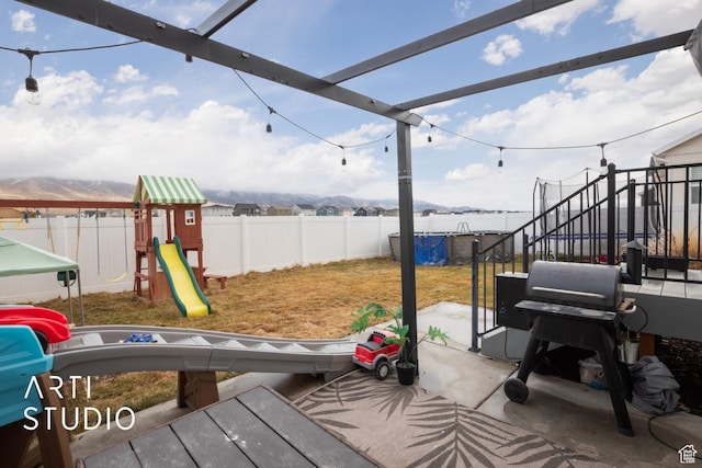 3516 N Willy Way, Eagle Mountain, UT 84005 - view of patio / terrace featuring a playground and a grill