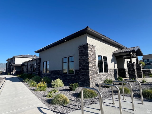 3516 N Willy Way, Eagle Mountain, UT 84005 - view of side of home with stucco siding and stone siding