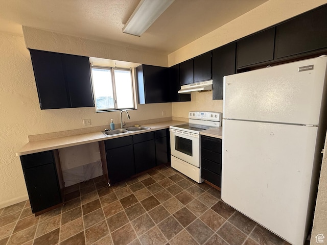1035 W Wenco Dr, Salt Lake City, UT 84104 - kitchen featuring white appliances, a sink, under cabinet range hood, dark cabinetry, and a textured wall