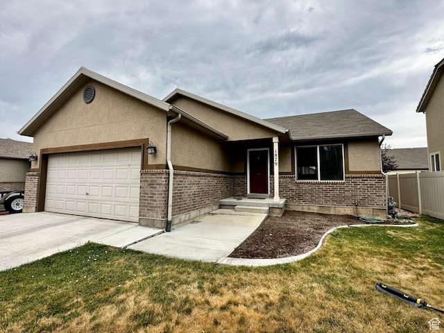 1879 E 1130 S, Spanish Fork, UT 84660 - single story home featuring a garage, brick siding, stucco siding, and concrete driveway