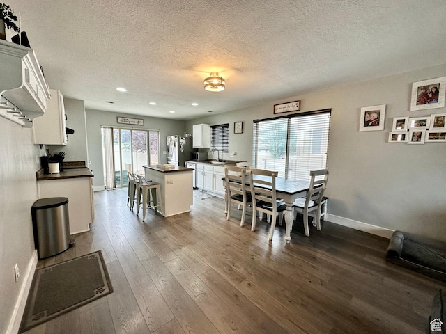 1879 E 1130 S, Spanish Fork, UT 84660 - dining space featuring a textured ceiling, baseboards, recessed lighting, and dark wood-style flooring
