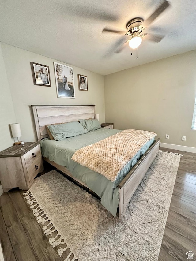 1879 E 1130 S, Spanish Fork, UT 84660 - bedroom featuring wood finished floors, a textured ceiling, baseboards, and ceiling fan