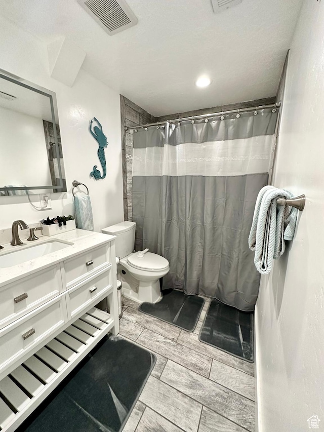 1879 E 1130 S, Spanish Fork, UT 84660 - bathroom with toilet, vanity, and a shower with shower curtain