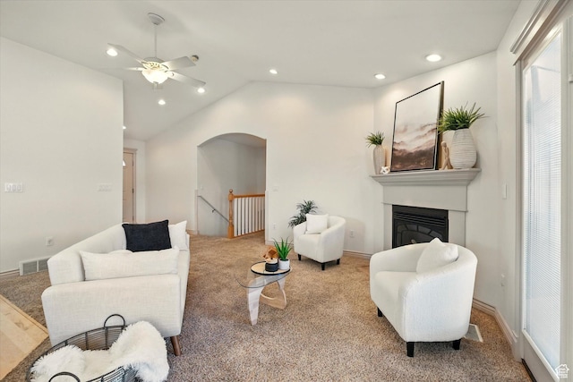 192 S 100 E, Wellsville, UT 84339 - living room with carpet floors, ceiling fan, arched walkways, lofted ceiling, and recessed lighting