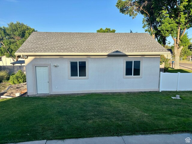 192 S 100 E, Wellsville, UT 84339 - rear view of property with roof with shingles and stucco siding