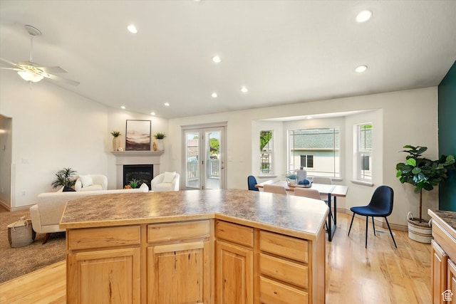 192 S 100 E, Wellsville, UT 84339 - kitchen featuring open floor plan, light wood finished floors, recessed lighting, a fireplace, and ceiling fan