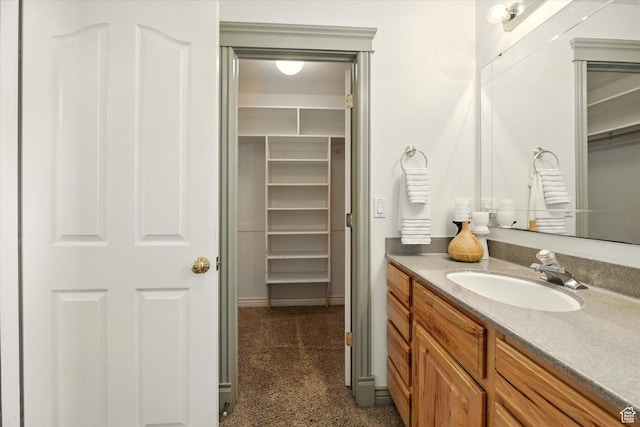 192 S 100 E, Wellsville, UT 84339 - bathroom featuring vanity and a spacious closet