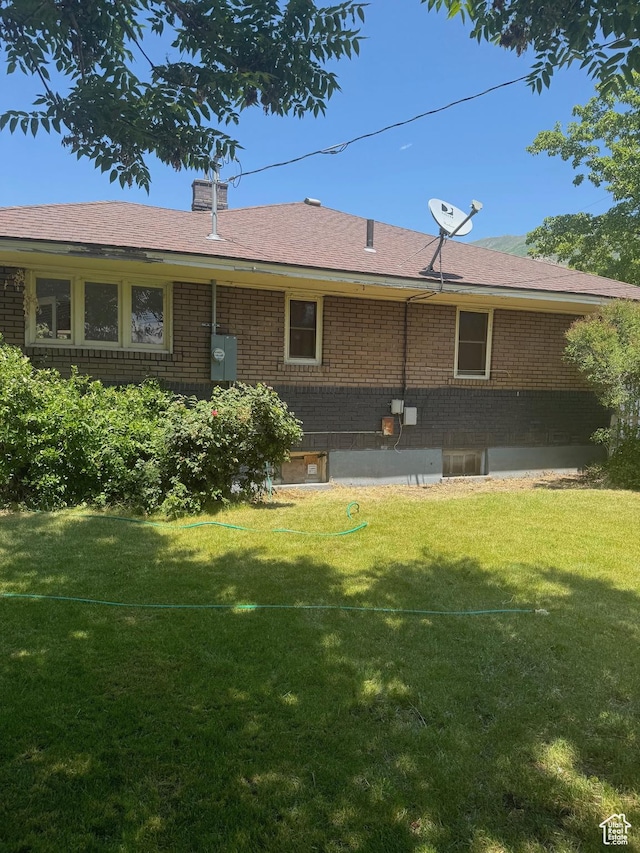 248 E 300 S, Springville, UT 84663 - rear view of property with brick siding and a lawn
