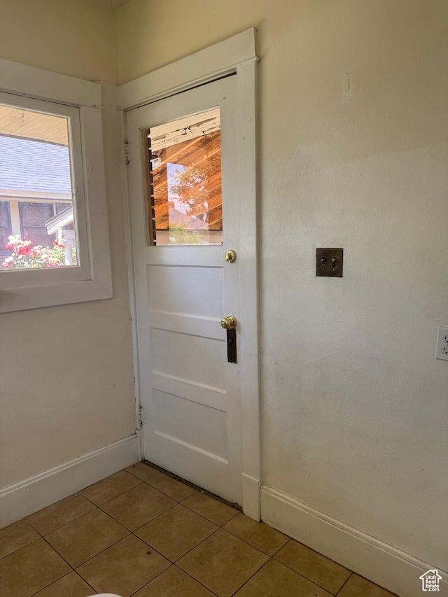 248 E 300 S, Springville, UT 84663 - doorway featuring light tile patterned floors, baseboards, and plenty of natural light