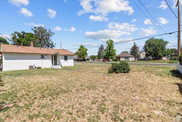 496 N 500 E, Nephi, UT 84648 - view of grassy yard featuring central air condition unit and entry steps