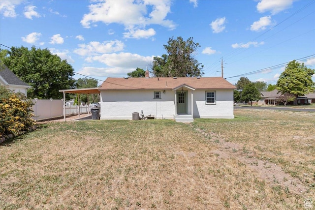 496 N 500 E, Nephi, UT 84648 - rear view of property with entry steps, stucco siding, and an attached carport