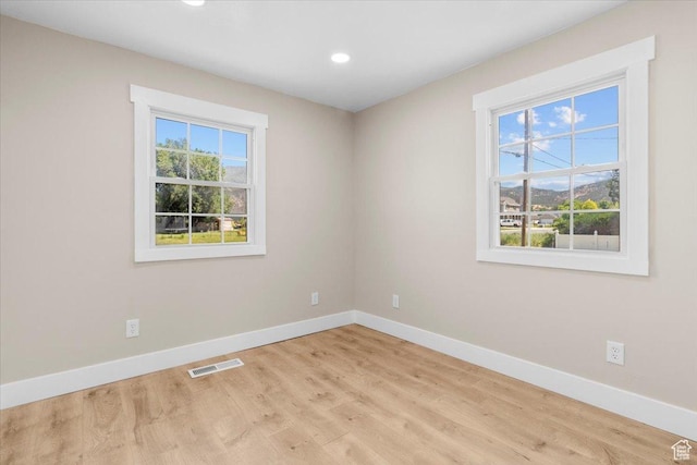 496 N 500 E, Nephi, UT 84648 - spare room with baseboards, light wood-type flooring, and recessed lighting