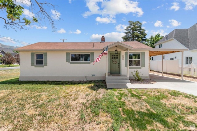 496 N 500 E, Nephi, UT 84648 - single story home featuring concrete driveway, an attached carport, and stucco siding