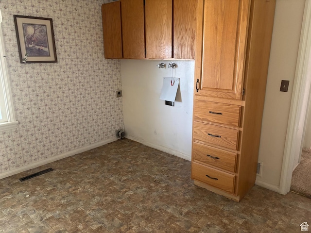 622 S Main St, Gunnison, UT 84634 - laundry room with cabinet space, baseboards, and electric dryer hookup