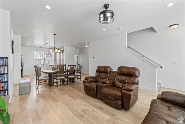 10849 S Lake Run Rd Unit 187, South Jordan, UT 84009 - living area with light wood-style floors, stairs, a chandelier, baseboards, and recessed lighting