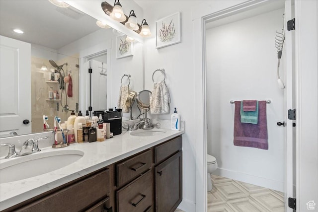 10849 S Lake Run Rd Unit 187, South Jordan, UT 84009 - bathroom with double vanity, toilet, and a shower