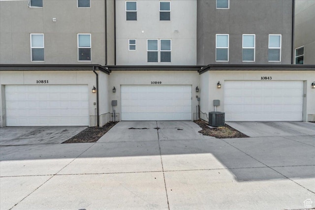 10849 S Lake Run Rd Unit 187, South Jordan, UT 84009 - garage featuring driveway