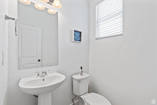 10849 S Lake Run Rd Unit 187, South Jordan, UT 84009 - half bathroom featuring toilet and a sink