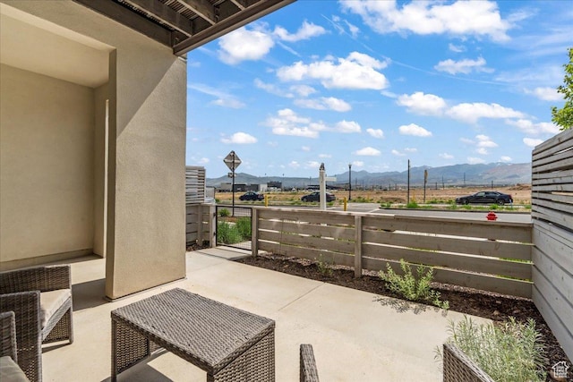 10849 S Lake Run Rd Unit 187, South Jordan, UT 84009 - view of patio featuring a mountain view