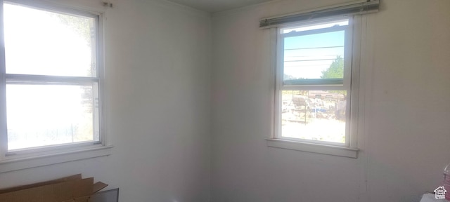 138 W Geneva Dr, East Carbon, UT 84520 - empty room with crown molding