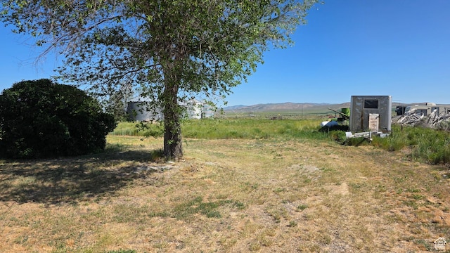 20915 W 1300 S, Malad City, ID 83252 - view of yard featuring a mountain view and a view of rural / pastoral area