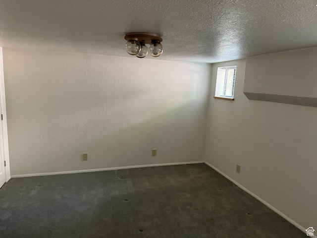 67 S 200 E, Pleasant Grove, UT 84062 - below grade area featuring carpet flooring, baseboards, and a textured ceiling