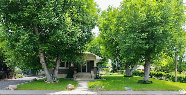 67 S 200 E, Pleasant Grove, UT 84062 - obstructed view of property featuring a front yard