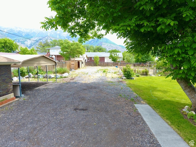 67 S 200 E, Pleasant Grove, UT 84062 - view of yard featuring a mountain view and a carport